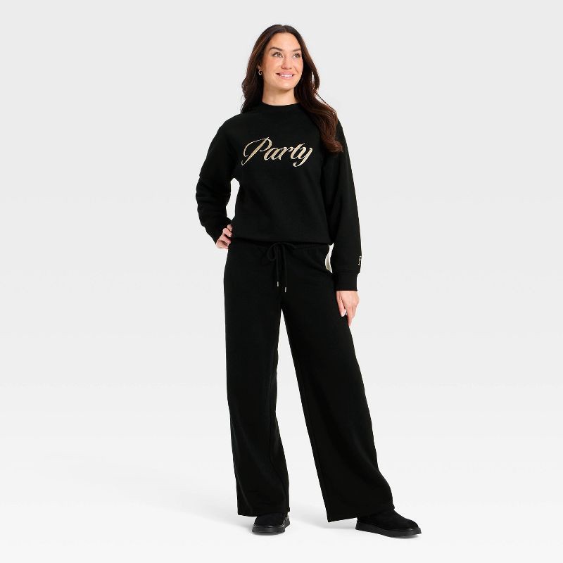 slide 3 of 3, Women's Holiday Knit Embroidered Pullover Sweatshirt - Universal Thread™ Black L, 1 ct