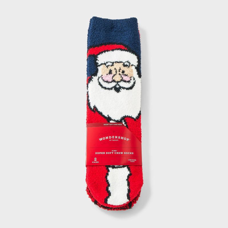 slide 2 of 3, Kids' 2pk Santa & Plaid Cozy Crew Socks with Gift Card Holder - Wondershop™ Red/Navy Blue M/L, 2 ct