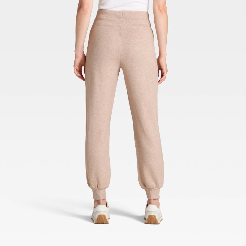 slide 2 of 3, Women's High-Rise Knit Joggers - Universal Thread™ Heather Oatmeal L, 1 ct