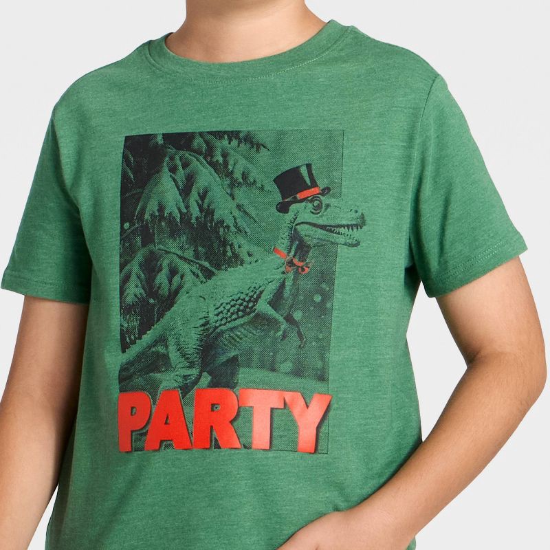 slide 2 of 4, Boys' Short Sleeve Dino Party Graphic T-Shirt - Cat & Jack™ Green M, 1 ct