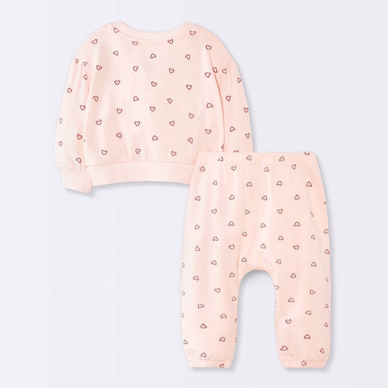 slide 2 of 4, Baby Girls' 2pc Christmas Holiday Candy Cane Heart Fleece Sweatshirt and Jogger Pants Set - Cloud Island™ Pink 0-3M, 2 ct