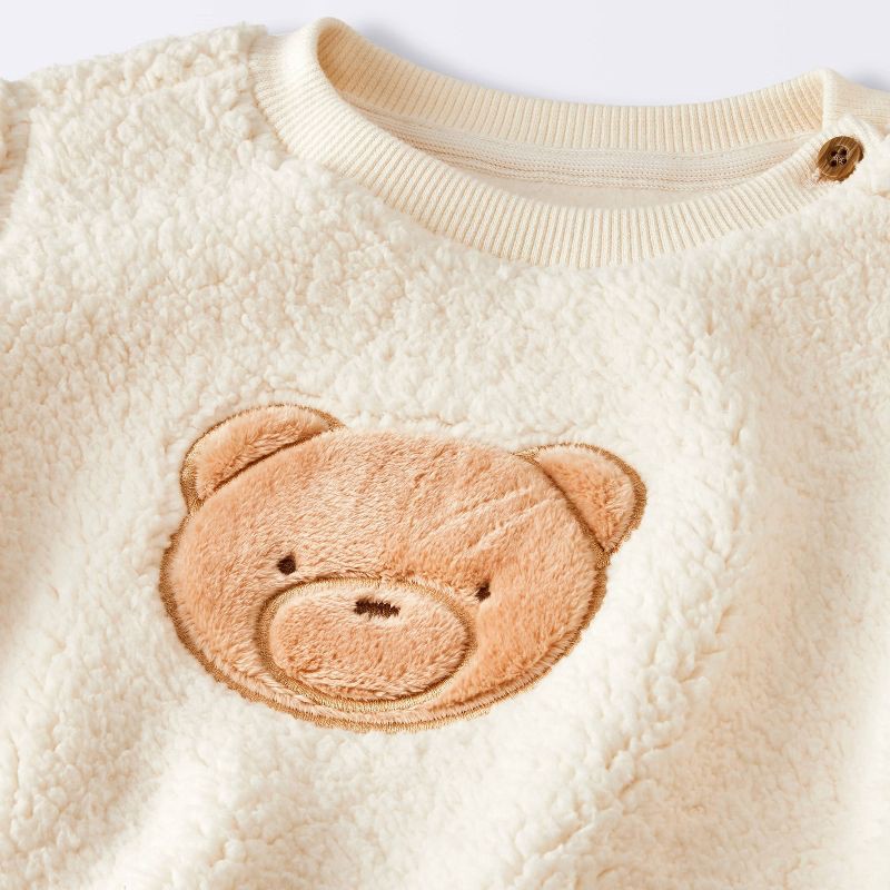 slide 3 of 4, Baby Boys' 2pc Bear Faux Shearling Sweatshirt and Ribbed Pants Set - Cloud Island™ Cream 6-9M, 2 ct