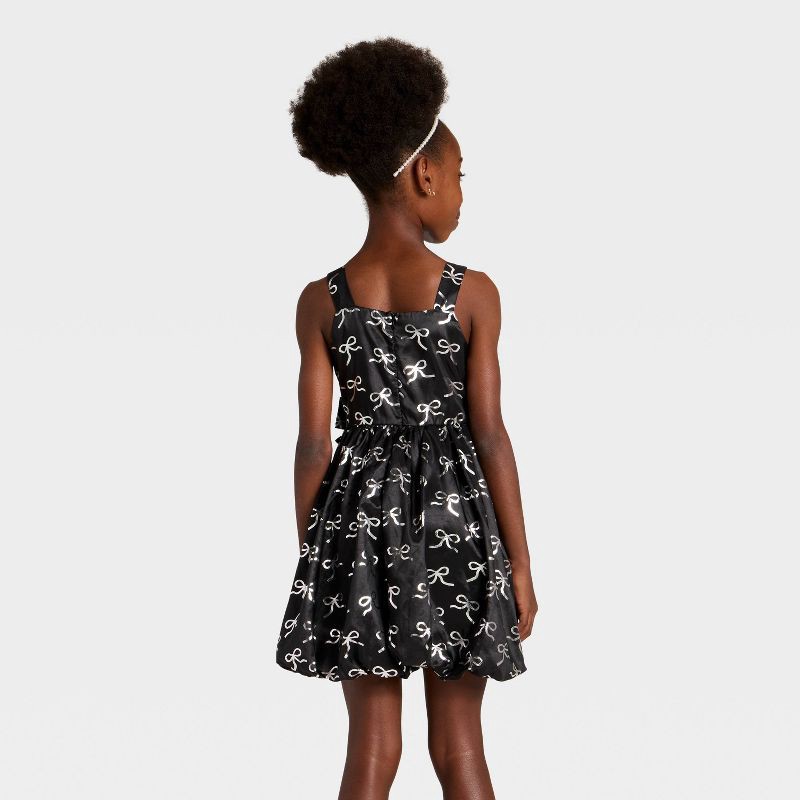slide 2 of 3, Girls' Audrey Camille Bow Bubble Tank Dress - Black L, 1 ct