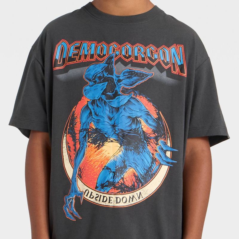 slide 2 of 4, Boys' Stranger Things Demogorgon Short Sleeve Oversized Graphic T-Shirt - Black L, 1 ct