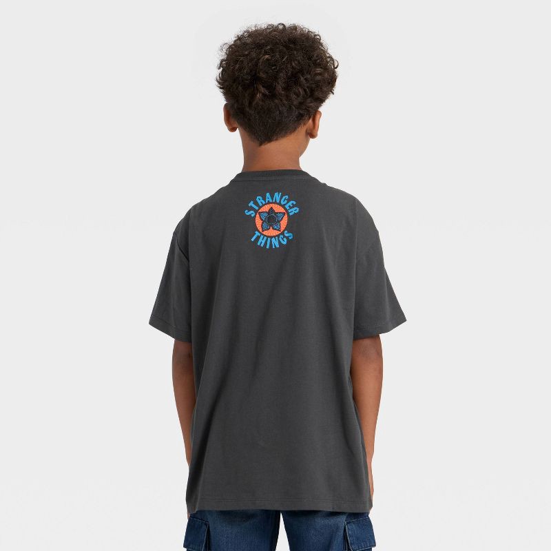 slide 3 of 4, Boys' Stranger Things Demogorgon Short Sleeve Oversized Graphic T-Shirt - Black L, 1 ct