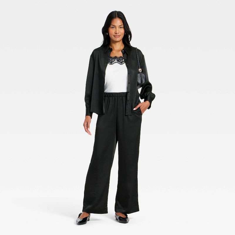 slide 3 of 3, Women's Satin Low-Rise Pull-On Pants - A New Day™ Black S, 1 ct