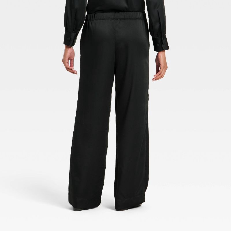 slide 2 of 3, Women's Satin Low-Rise Pull-On Pants - A New Day™ Black M, 1 ct