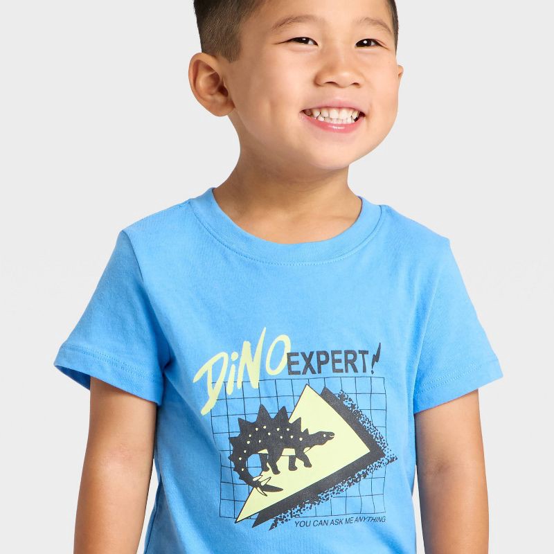 slide 2 of 4, Toddler Boys' Short Sleeve Dino Expert Graphic T-Shirt - Cat & Jack™ Blue 4T, 1 ct