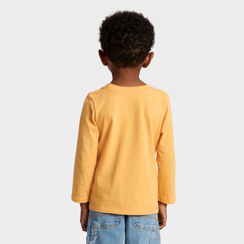 slide 2 of 4, Toddler Boys' Long Sleeve Cruiser Graphic T-Shirt - Cat & Jack™ Gold 2T, 1 ct