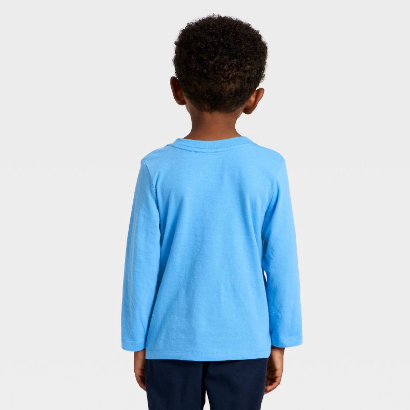 slide 3 of 4, Toddler Boys' Long Sleeve Dino Expert Graphic T-Shirt - Cat & Jack™ Sky Blue 3T, 1 ct