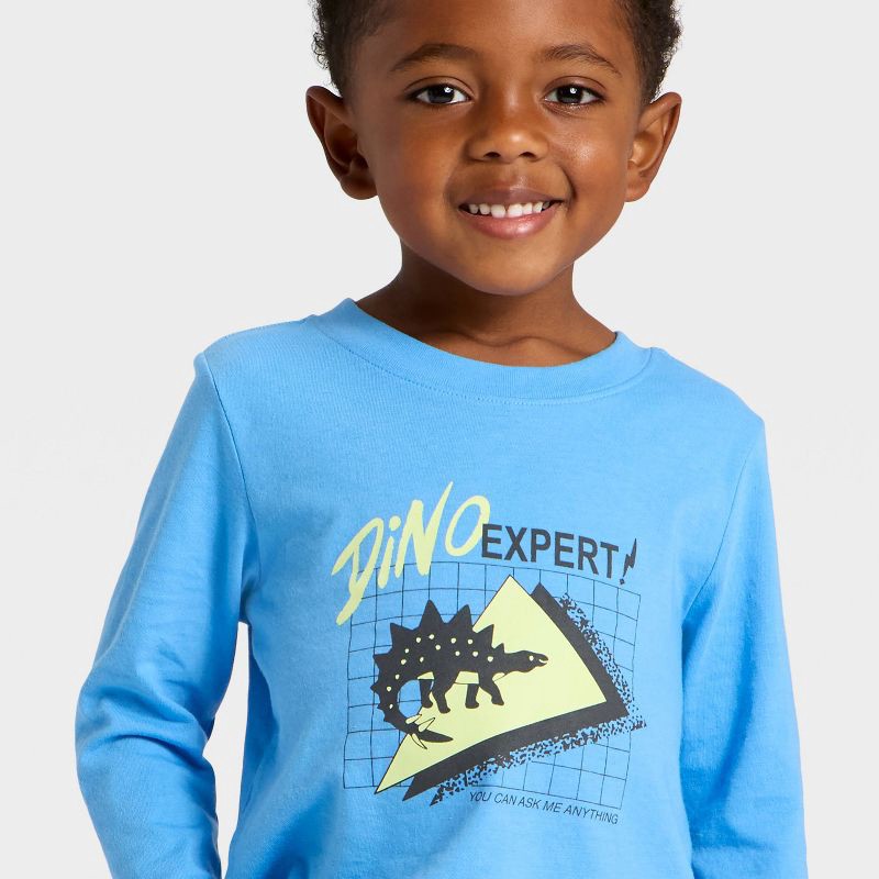 slide 2 of 4, Toddler Boys' Long Sleeve Dino Expert Graphic T-Shirt - Cat & Jack™ Sky Blue 4T, 1 ct