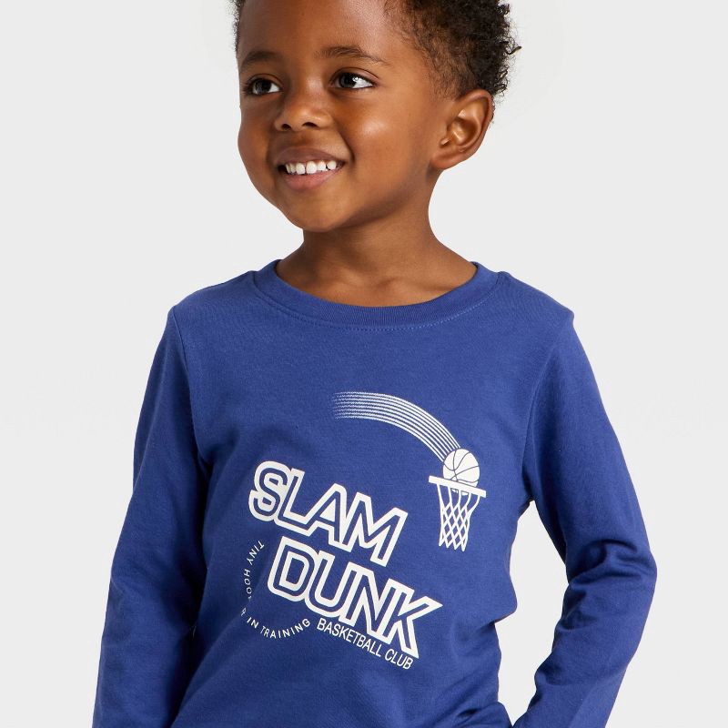 slide 2 of 4, Toddler Boys' Long Sleeve Slam Dunk Graphic T-Shirt - Cat & Jack™ Dark Blue 5T, 1 ct