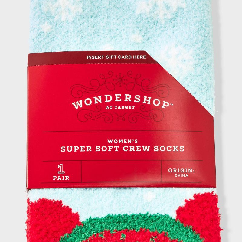 slide 3 of 3, Women's Winter Penguin Christmas Cozy Crew Socks with Gift Card Holder - Wondershop™ Light Blue 4-10, 1 ct
