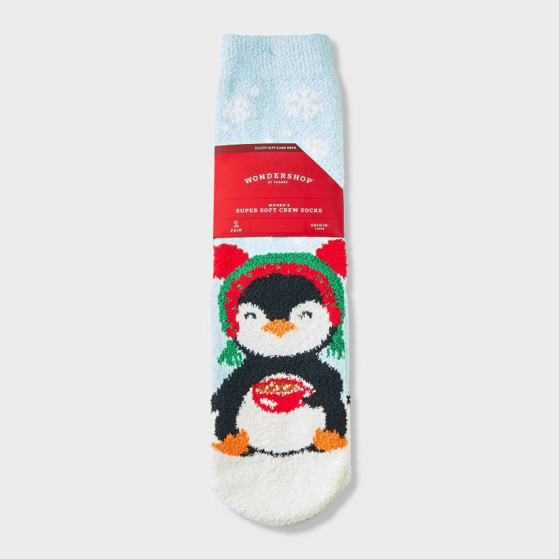 slide 1 of 3, Women's Winter Penguin Christmas Cozy Crew Socks with Gift Card Holder - Wondershop™ Light Blue 4-10, 1 ct