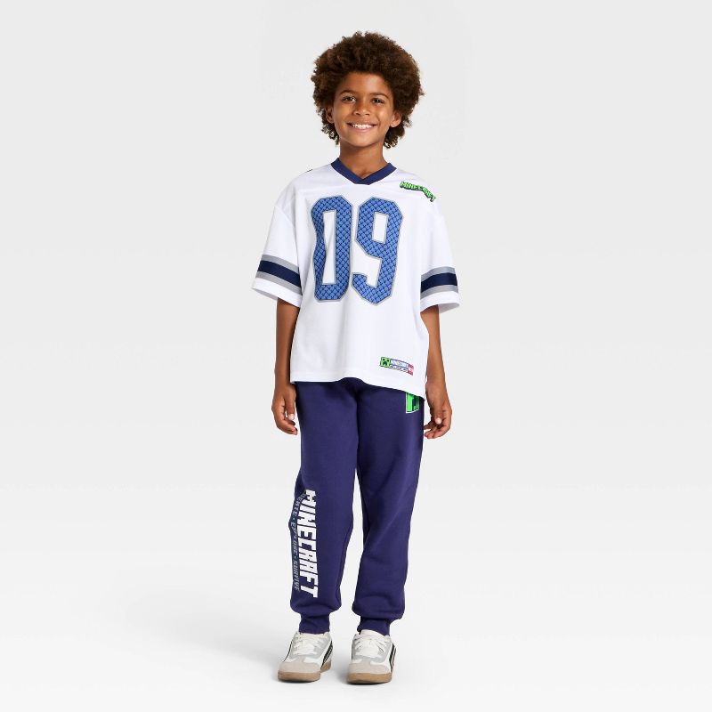 slide 2 of 4, Boys' Marvel Minecraft Creeper Fleece Sweatpants - Navy Blue M, 1 ct