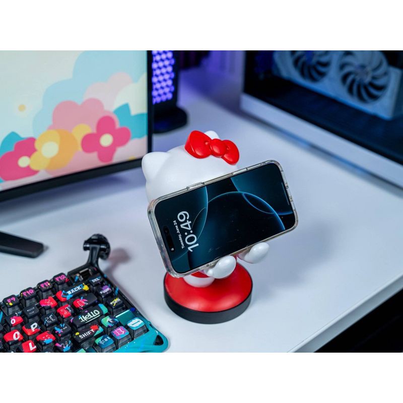 slide 4 of 8, Hello Kitty Cable Guy Phone and Controller Holder, 1 ct