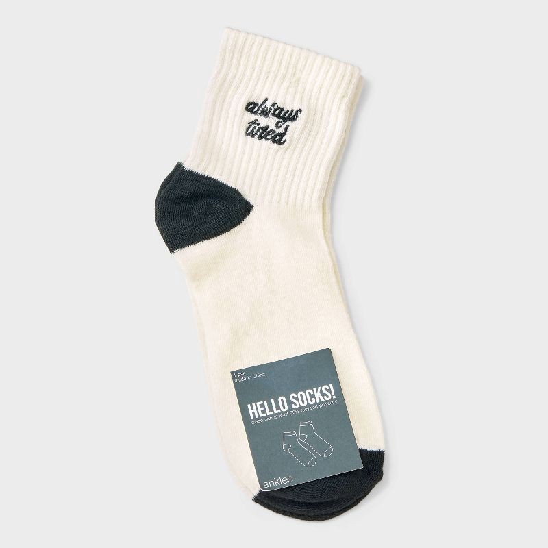 slide 2 of 3, Women's Embroidered 'Always Tired' Ankle Socks - Ivory/Black 4-10, 1 ct