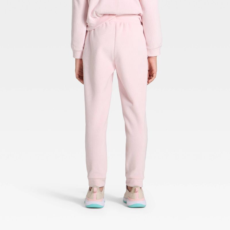 slide 2 of 3, Girls' Cozy Ribbed Jogger Pants - All In Motion™ Light Pink M, 1 ct
