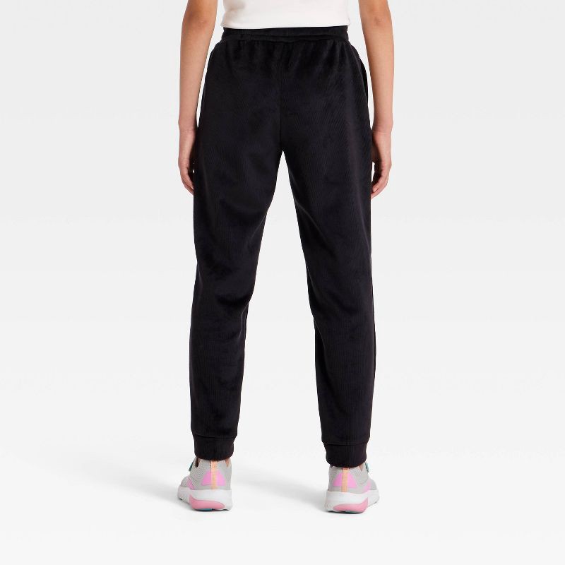 slide 2 of 3, Girls' Cozy Ribbed Jogger Pants - All In Motion™ Black L, 1 ct