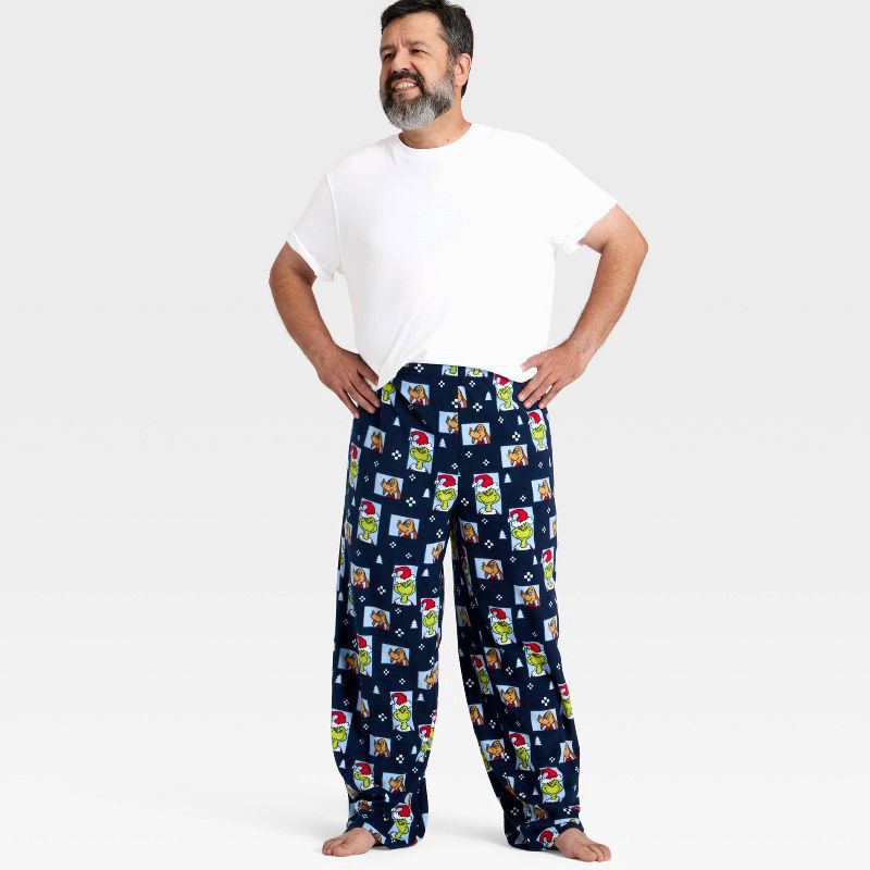 slide 3 of 4, The Grinch Men's Grinch Print Fleece Holiday Matching Family Pajama Pants - Navy Blue XL, 1 ct