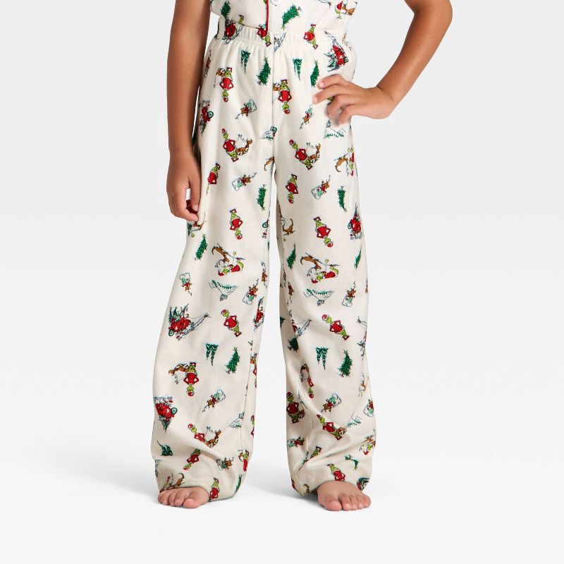slide 4 of 8, The Grinch Toddler Grinch Print Long Sleeve Shirt and Pants Holiday Matching Family Pajama Set - Cream 12M, 1 ct