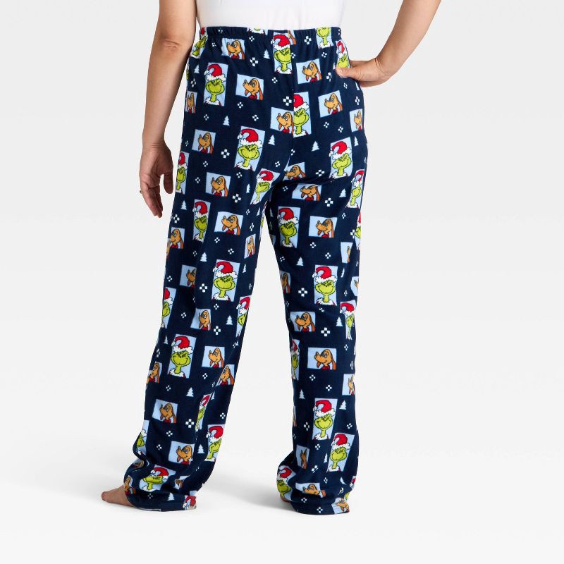 slide 2 of 4, Women's The Grinch Print Fleece Holiday Matching Family Pajama Pants - Navy Blue XS, 1 ct