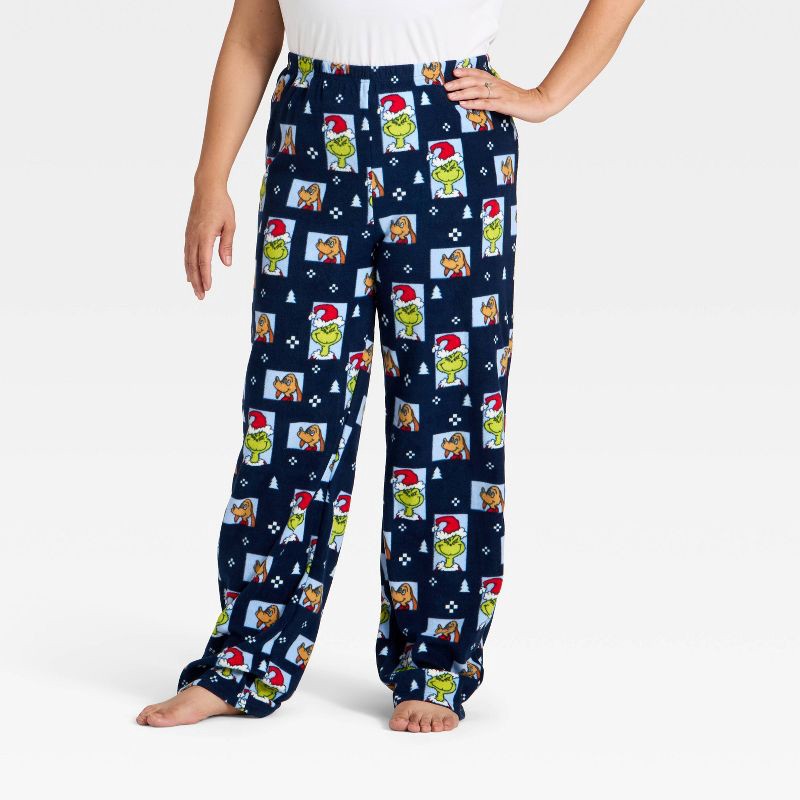slide 1 of 4, Women's The Grinch Print Fleece Holiday Matching Family Pajama Pants - Navy Blue XS, 1 ct