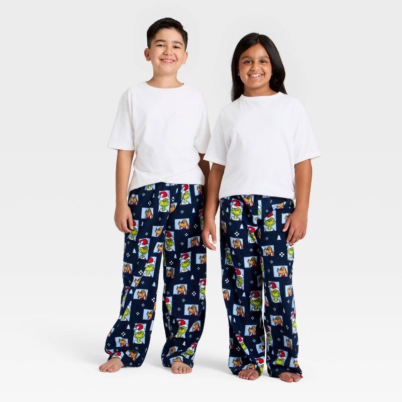 slide 1 of 4, Kids' The Grinch Microfleece Holiday Matching Family Pajama Pants - Navy Blue M, 1 ct