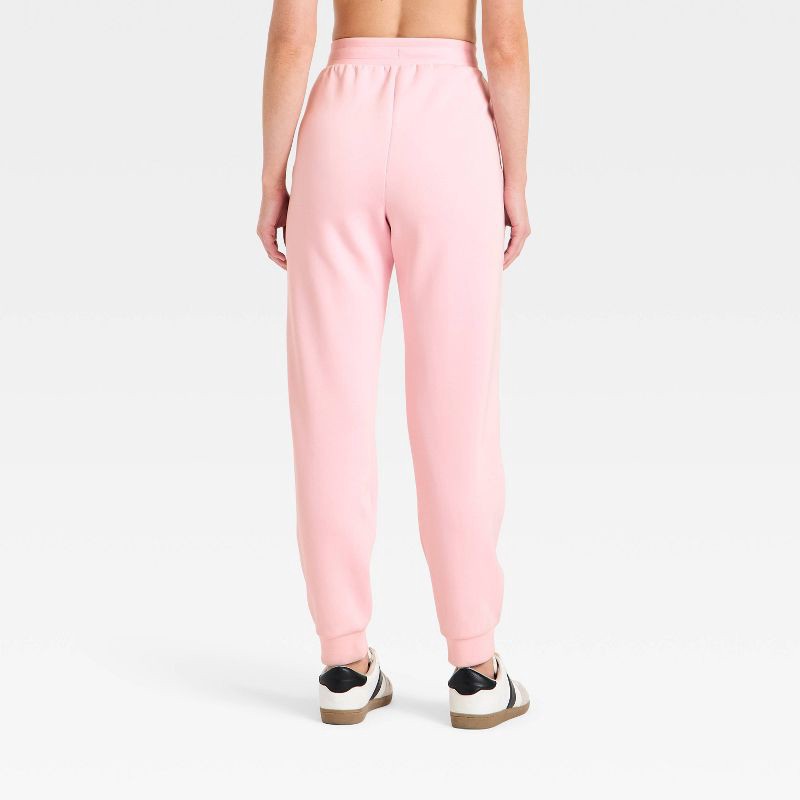 slide 2 of 5, Women's Airy Sleek Jogger Sweatpants - All In Motion™ Light Pink XS, 1 ct