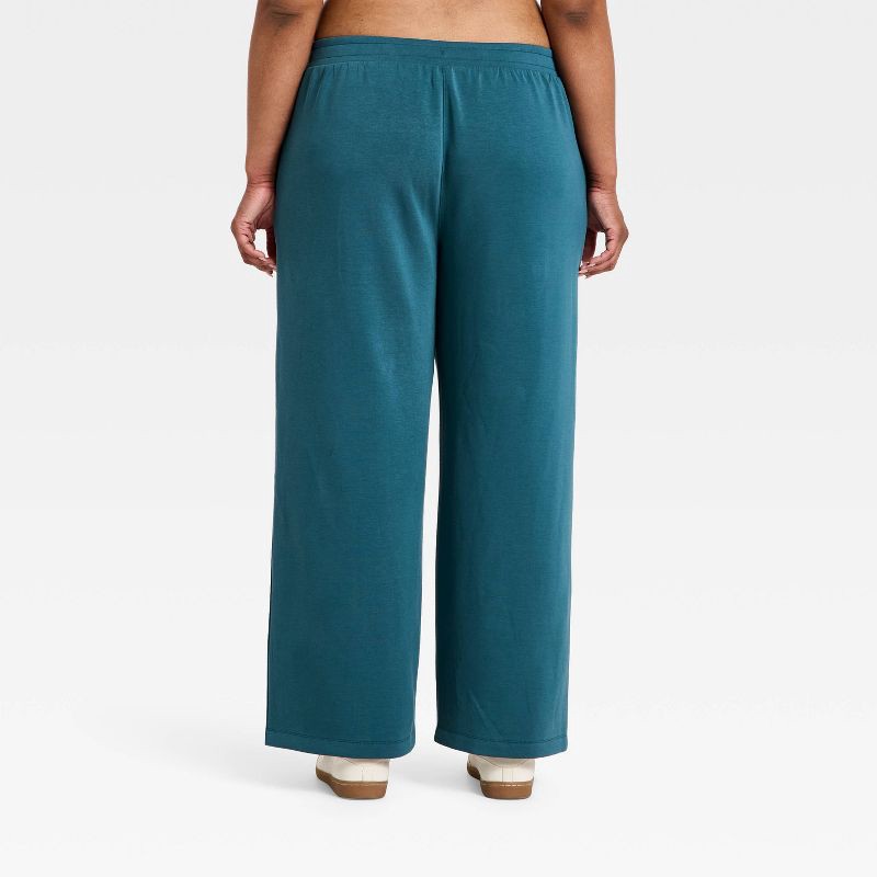 slide 3 of 5, Women's Airy Sleek Ribbed Wide Leg Sweatpants - All In Motion™ Blue M, 1 ct