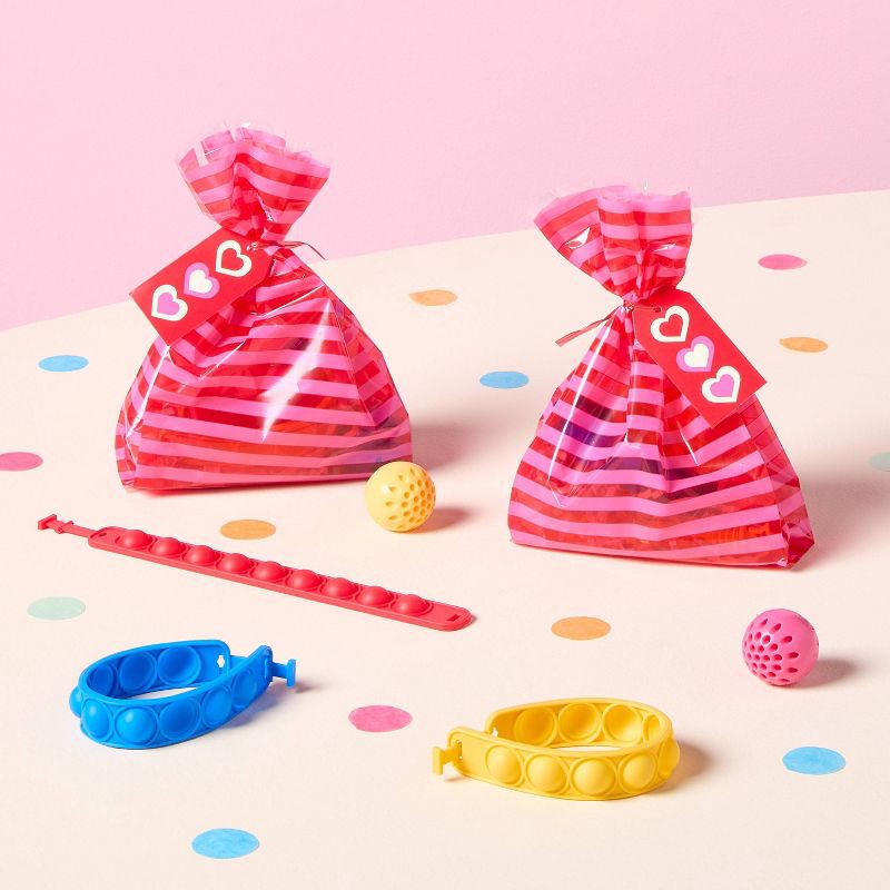 slide 2 of 3, 12ct Valentine's Day Pop-It Bracelets Party Favor Set - Spritz™, 12 ct