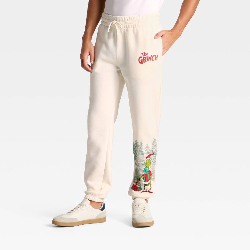 slide 2 of 3, Adult The Grinch Fleece Graphic Joggers - Cream M, 1 ct