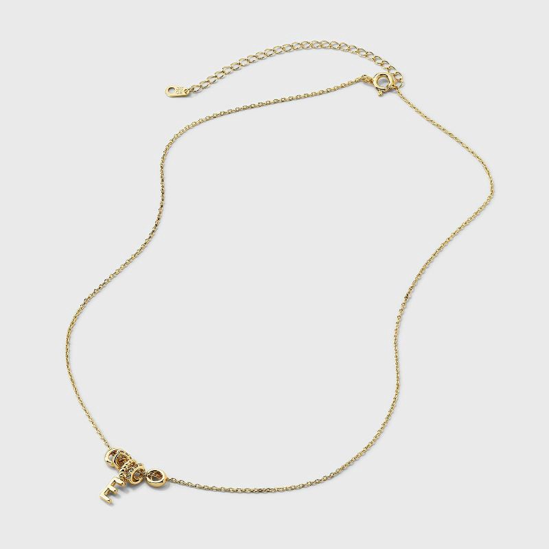slide 4 of 4, 14K Gold Dipped Cubic Zirconia Rondelle E Initial Necklace - A New Day™ Gold, 1 ct