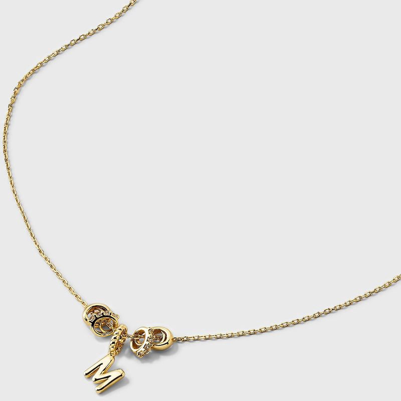 slide 3 of 4, 14K Gold Dipped Cubic Zirconia Rondelle M Initial Necklace - A New Day™ Gold, 1 ct