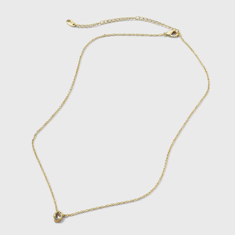 slide 3 of 4, 14K Gold Dipped Cubic Zirconia Oval Necklace and Stud Earring Set 2pc - A New Day™ Gold, 2 ct