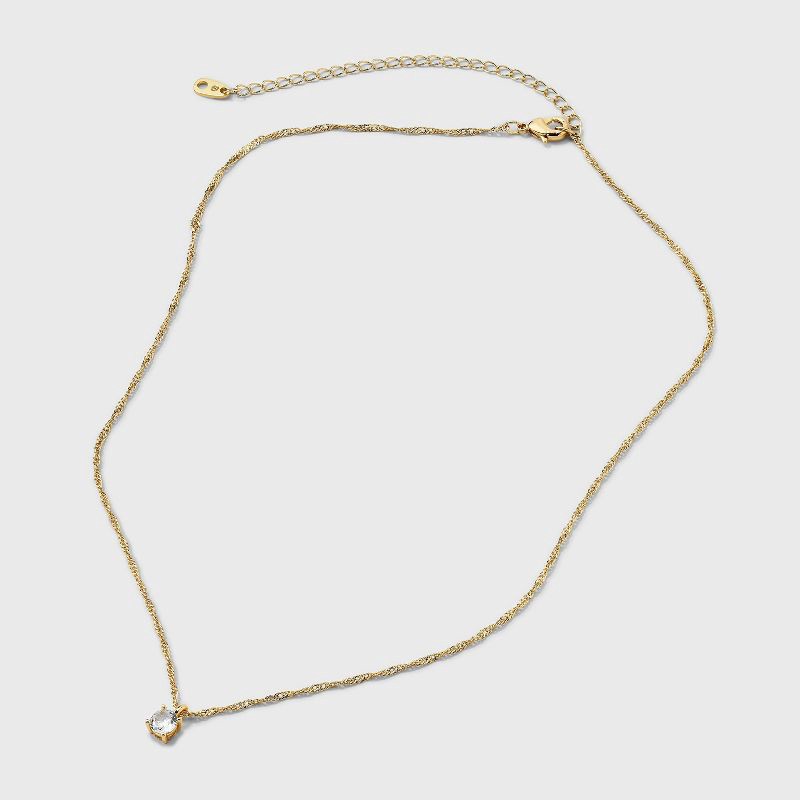 slide 2 of 5, 14K Gold Dipped Cubic Zirconia Bezel Necklace and Huggie Stud Earring Set 3pc - A New Day™ Gold, 3 ct