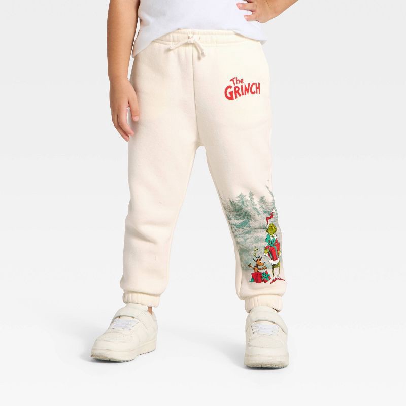 slide 2 of 3, Toddler The Grinch Fleece Joggers - Cream 18M, 1 ct