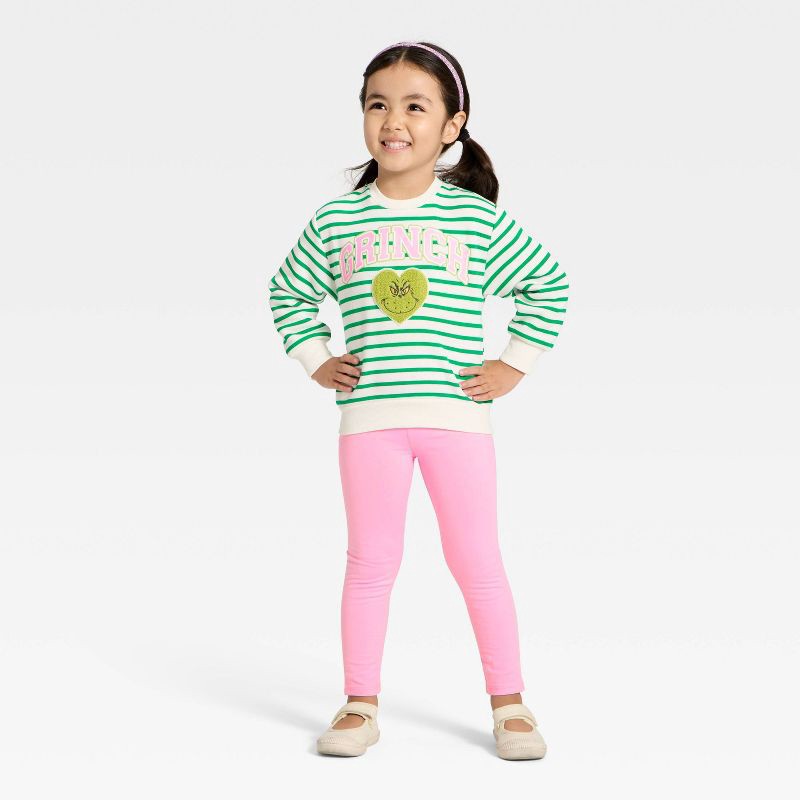 slide 1 of 4, Toddler Girls' 2pc The Grinch Christmas Fleece Sweatshirt and Pants Set - Pink/Green 4T, 2 ct