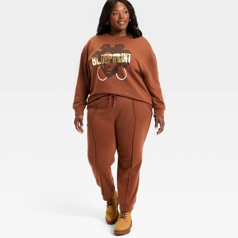 slide 3 of 4, Black History Month Legendary Rootz Women's Blueprint Joggers - Brown 1X, 1 ct