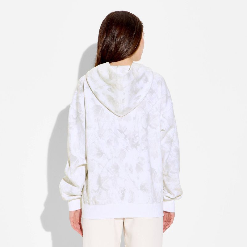 slide 3 of 3, Women's Oversized Graphic Hooded Pullover Sweatshirt - Wild Fable™ Camo XXS, 1 ct