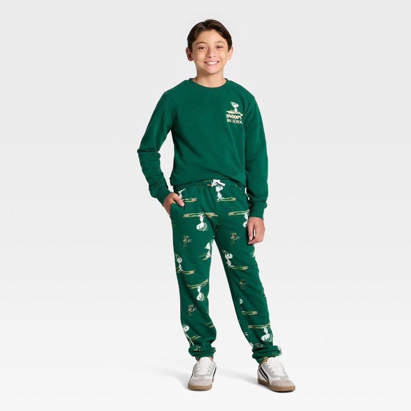 slide 4 of 4, Peanuts Boys' Snoopy Ski School Fleece Front and Back Graphic Sweatshirt - Green M, 1 ct