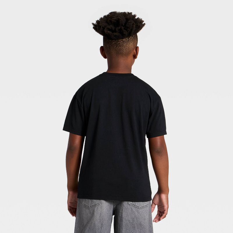 slide 3 of 4, DreamWorks Boys' Frosty The Snowman Holiday Short Sleeve Oversized Graphic T-Shirt - Black XS, 1 ct