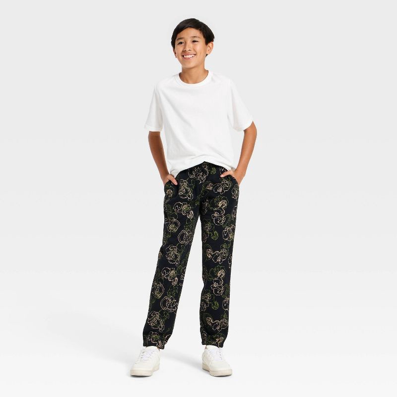 slide 3 of 3, Boys' The Grinch Graphic Fleece Jogger Pants - Black L, 1 ct