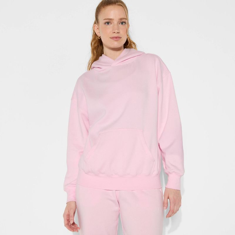 slide 1 of 3, Women's Oversized Bubble Hem Hooded Sweatshirt - Wild Fable™ Light Pink XXS, 1 ct