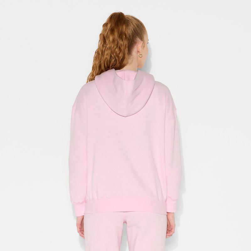 slide 3 of 3, Women's Oversized Bubble Hem Hooded Sweatshirt - Wild Fable™ Light Pink XS, 1 ct