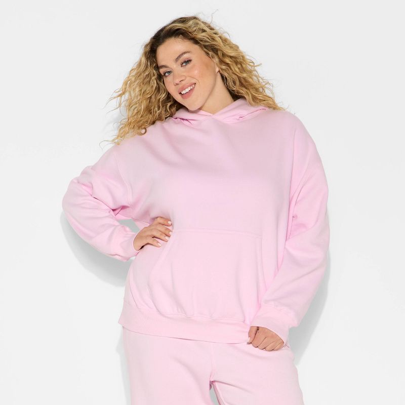 slide 2 of 3, Women's Oversized Bubble Hem Hooded Sweatshirt - Wild Fable™ Light Pink XXL, 1 ct