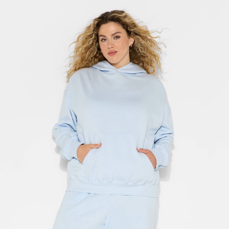 slide 2 of 3, Women's Oversized Bubble Hem Hooded Sweatshirt - Wild Fable™ Light Blue XXL, 1 ct