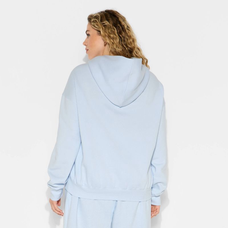 slide 3 of 3, Women's Oversized Bubble Hem Hooded Sweatshirt - Wild Fable™ Light Blue XXL, 1 ct