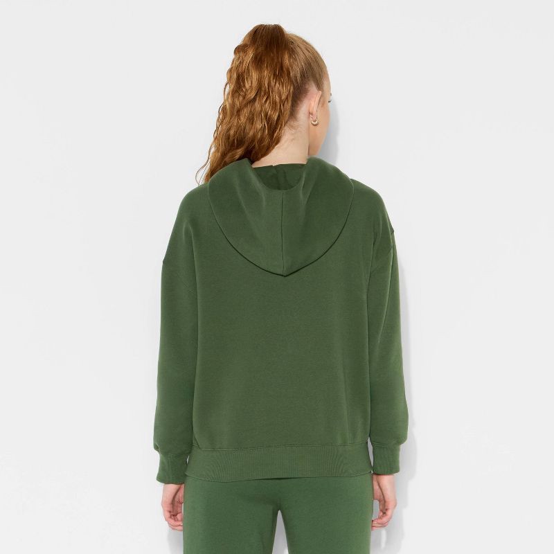 slide 3 of 3, Women's Oversized Bubble Hem Hooded Sweatshirt - Wild Fable™ Dark Green M, 1 ct