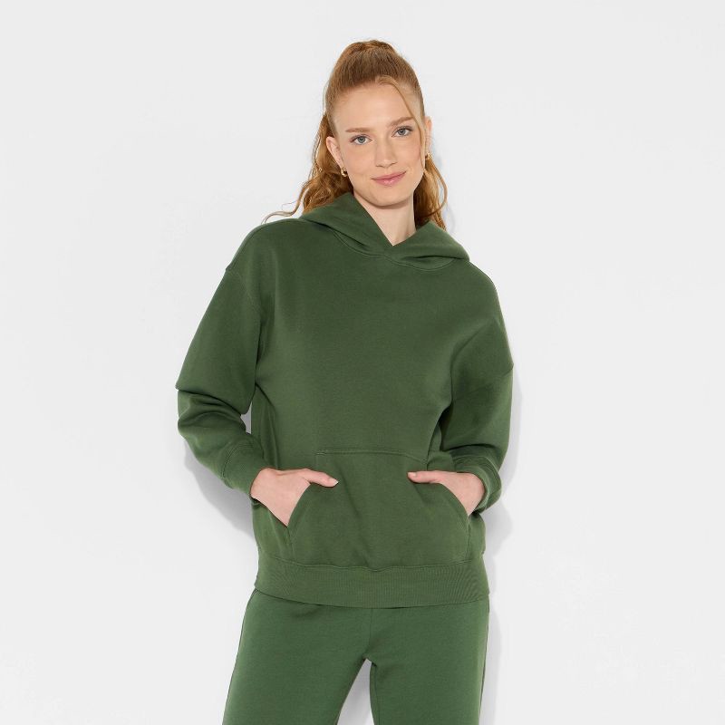 slide 2 of 3, Women's Oversized Bubble Hem Hooded Sweatshirt - Wild Fable™ Dark Green XL, 1 ct